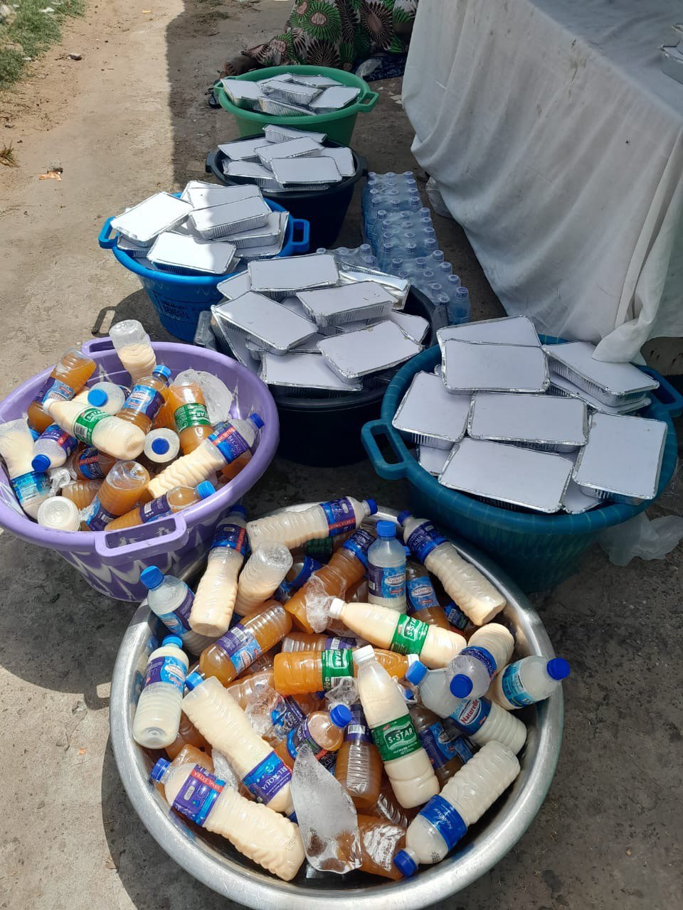 Food supplies and packed meals arranged for distribution